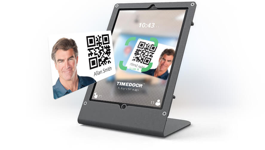 TimeDock employee time clock app on an iPad with desktop stand